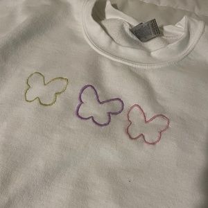 Hand embroidered butterfly crewneck